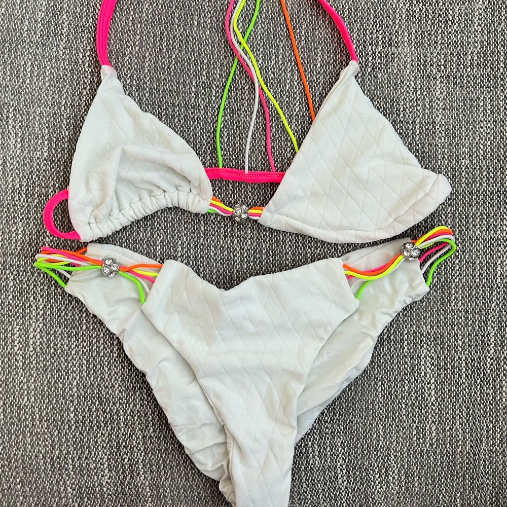 Sporty white Beachbunny suit. Perfect for neon parties or bachelorette!Worn once